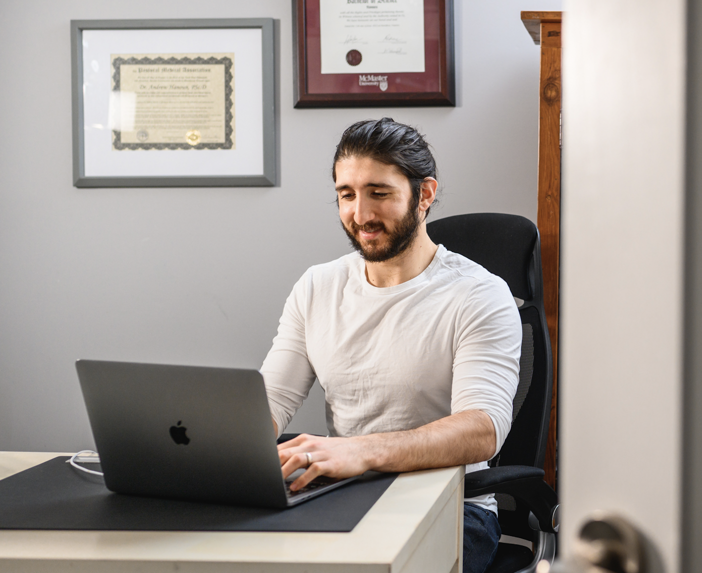 Andrew working on laptopo